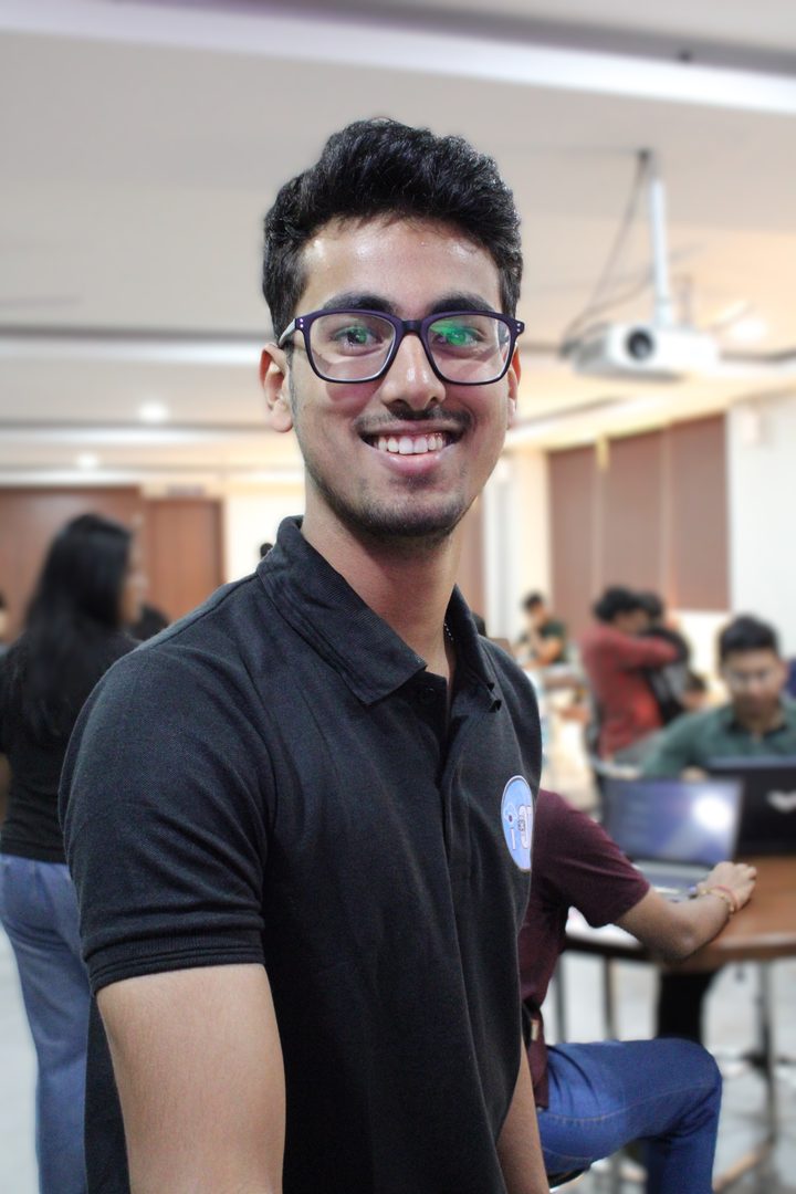 Aaron Chakraborty, mid-laugh at a lab session